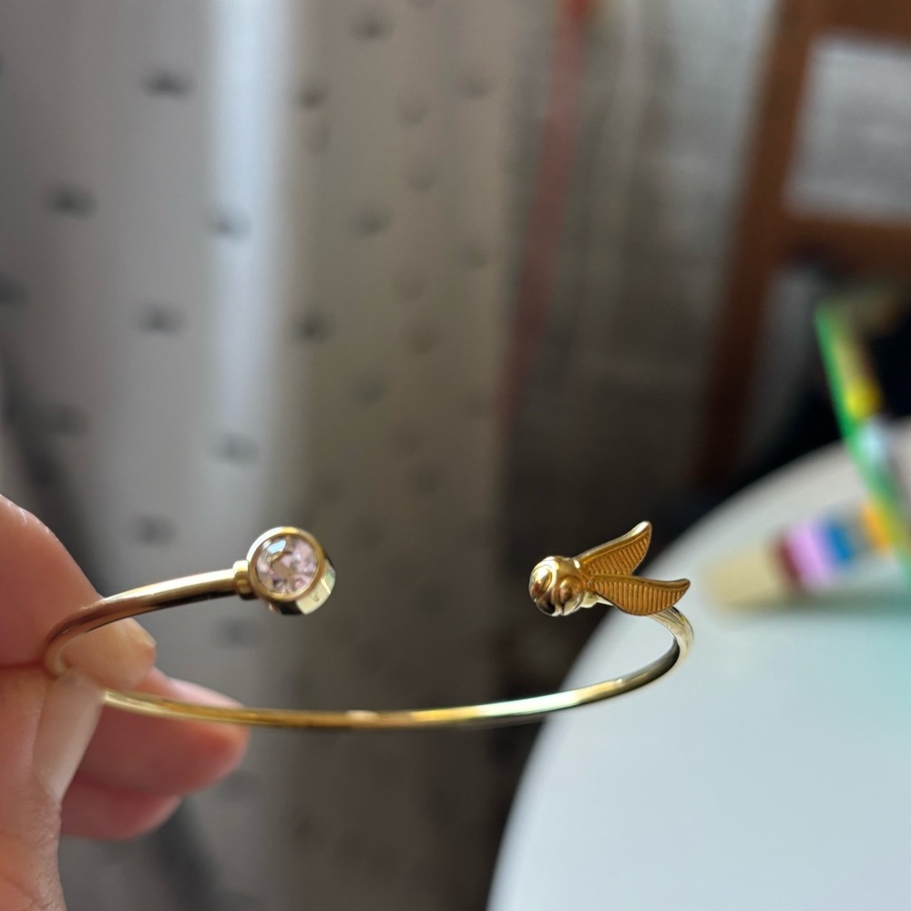 Golden Snitch bracelet with rhinestone. Brand new never worn! Subtle